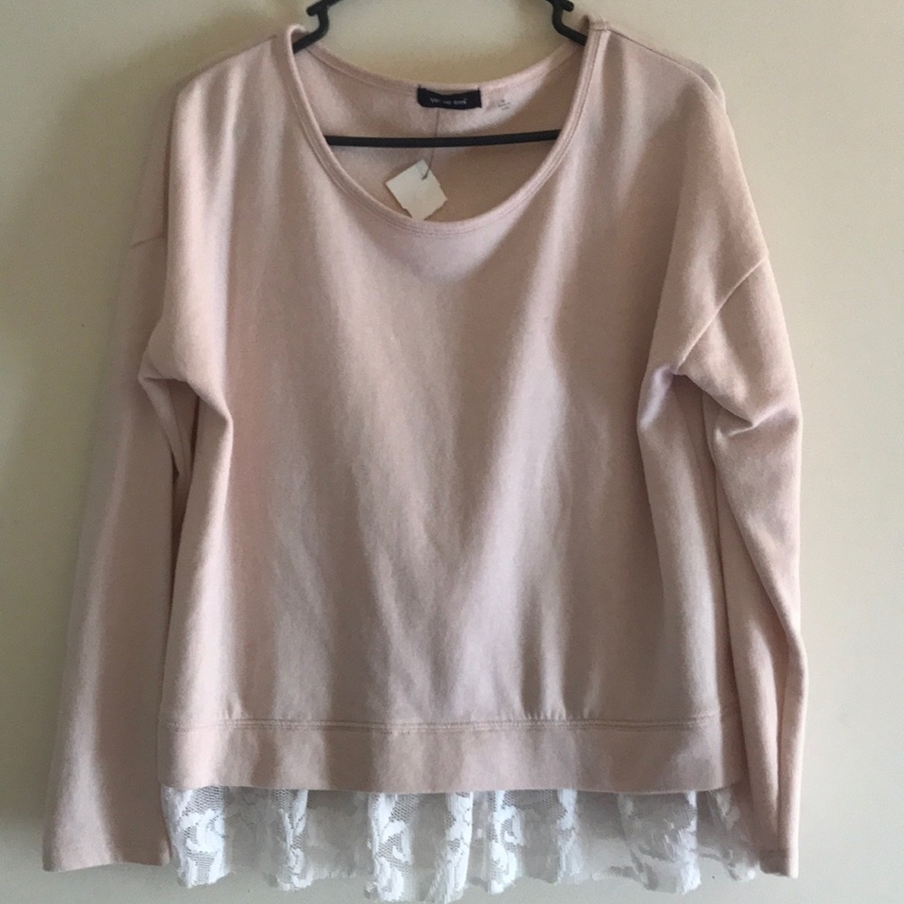 Pink sweater with white lace detail